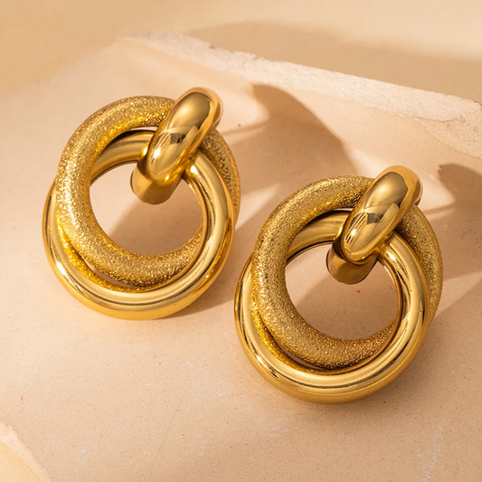 ARETES DOBLE CIRCULO LISO Y GLITTER
